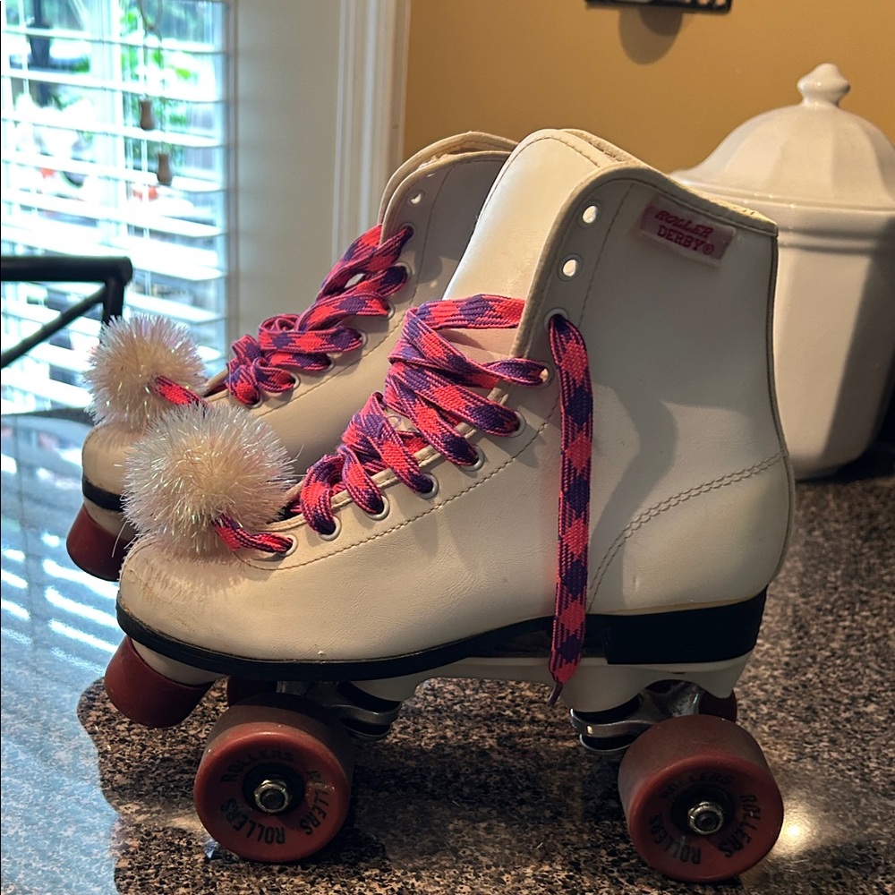 White Kids Roller Skates with Pink Laces and Pom-Poms
